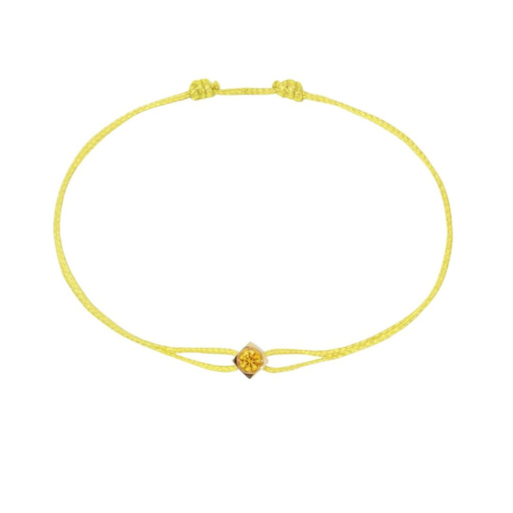 Braçalet dinh van le cube amb cordó groc i safir groc